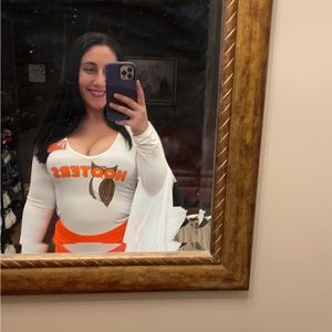 Hooters long sleeve shirt only worn once! A cute and sexy fit/style
